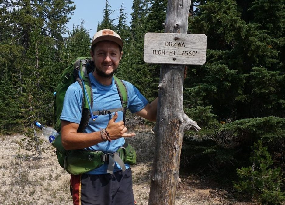 Harry Firth by a sign on his trek from Canada to Mexico - Healthy For ...